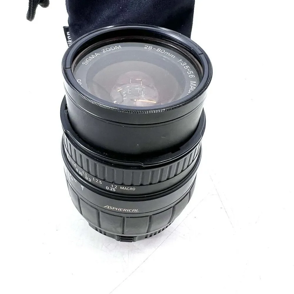 Sigma 28-80f/3.5-5.6 Aspherical Macro Lens w/a Tiffen Sky 1A Filter & Carry Bag